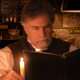 Image for article titled Dad Reads Menu With Restaurant Candle Like Archaeologist Deciphering Ancient Runes